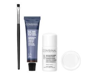 Blue Cominal lash & brow tint tube beside a white peroxide bottle and applicator brush on a white background