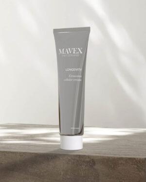 Gray tube labeled MAVEX Longevity Exosomes cellular cream standing on a wooden surface.
