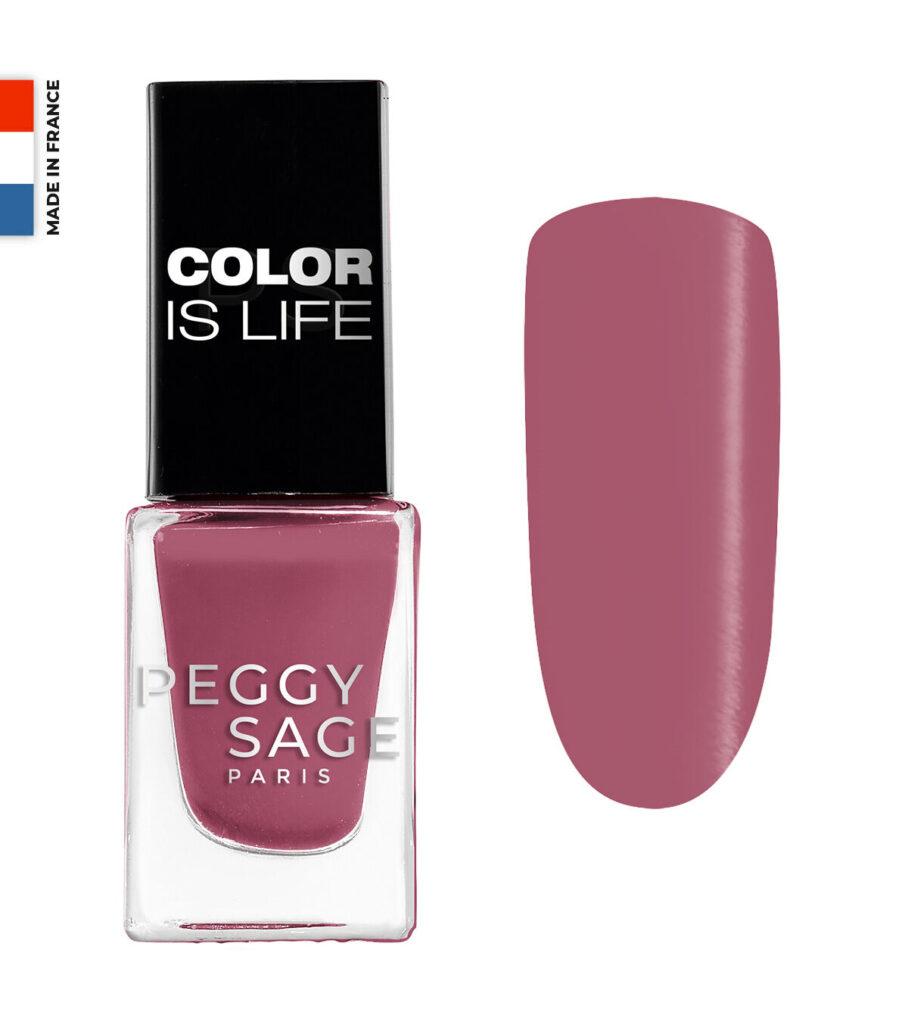 Nail polish bottle with black cap reading COLOR IS LIFE; pink mauve color swatch to the right; Peggy Sage Paris label on the bottle; small Made in France flag on the left.
