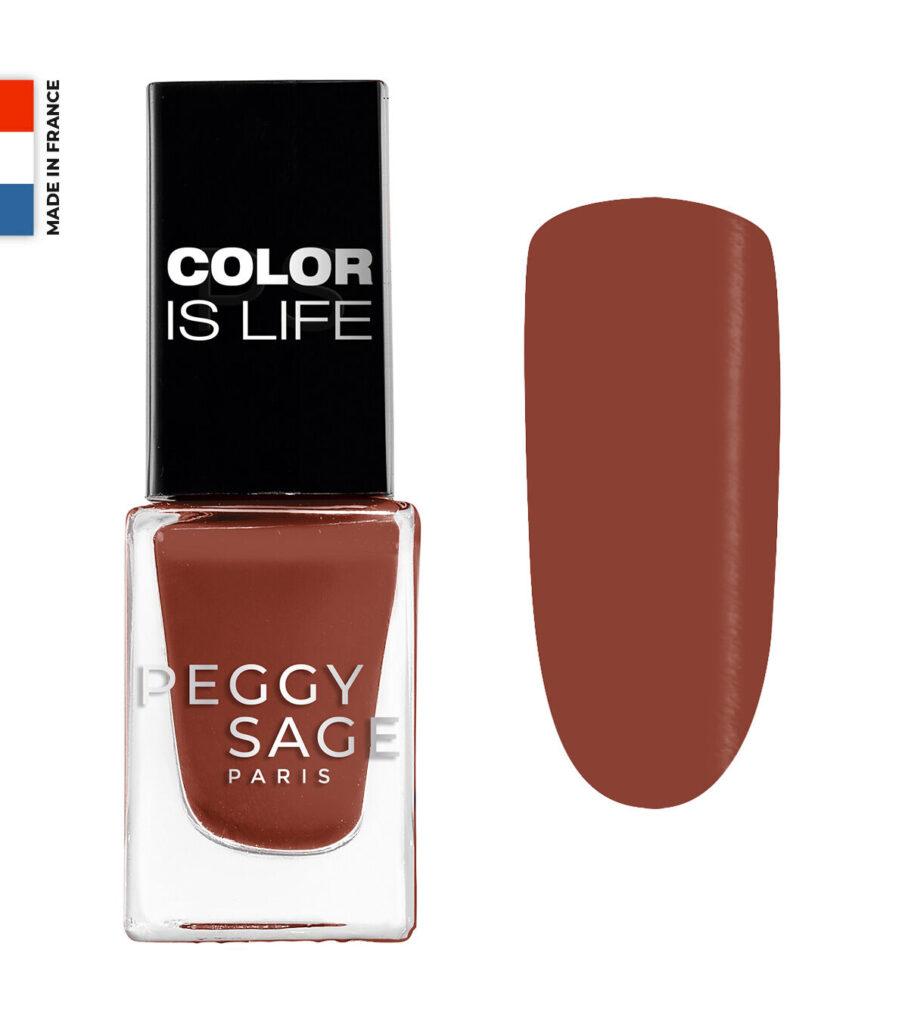 Peggy Sage Paris nail polish bottle with a warm brown shade and a color swatch to the right.