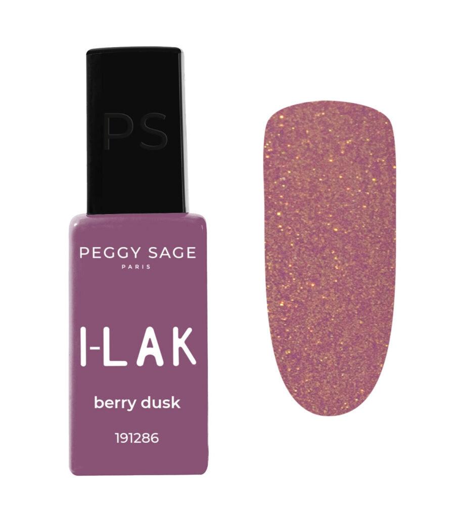 Peggy Sage I-LAK berry dusk nail polish bottle with a purple glitter swatch nearby.