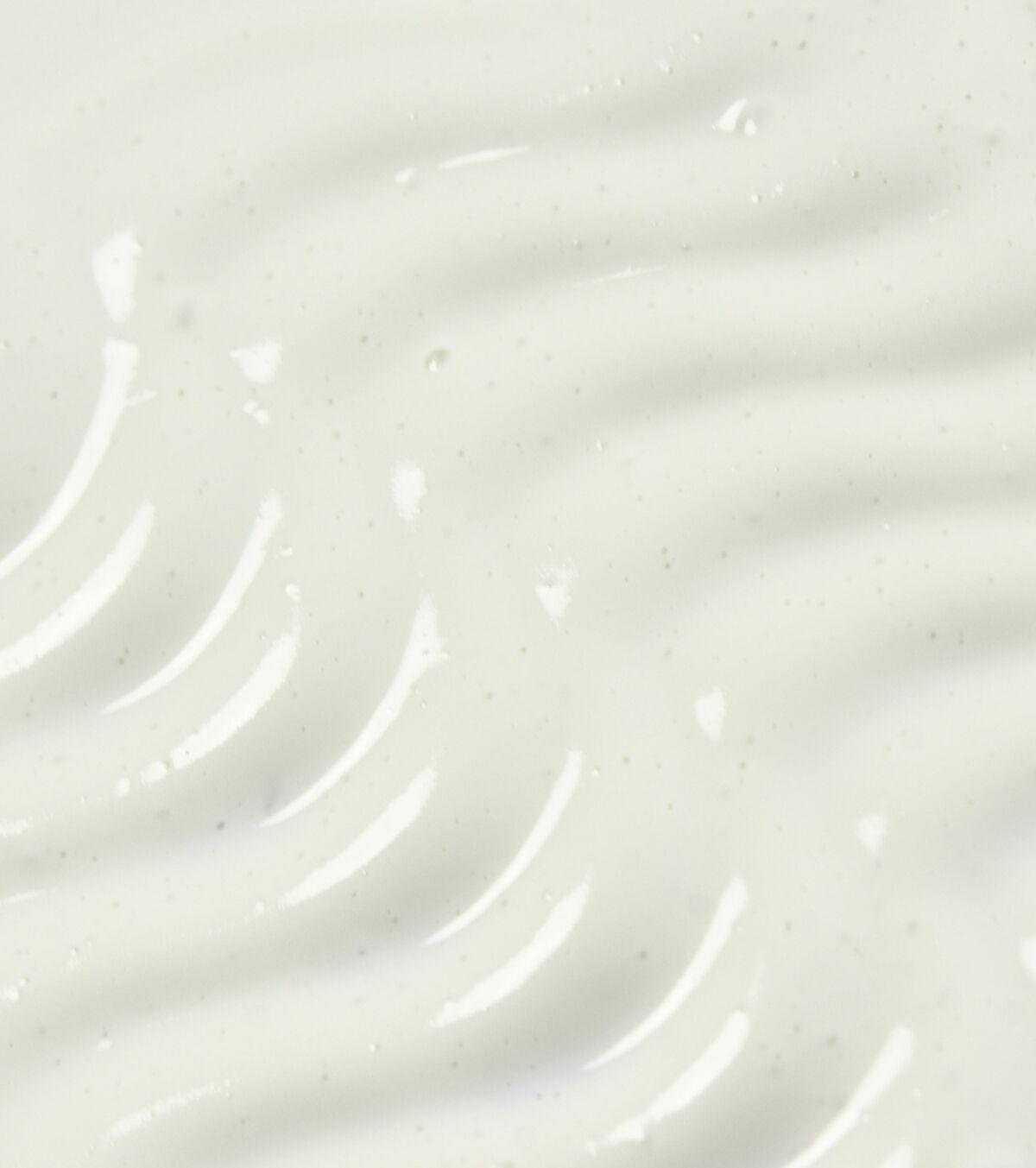 400313-5 | ATE Bordeaux Close-up of a smooth, creamy white surface with circular ripple patterns and tiny specks.