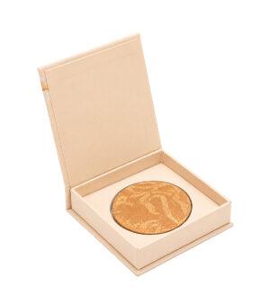 822600 | ATE Bordeaux Gold-toned round makeup compact inside an open beige box, displayed for gifting or presentation